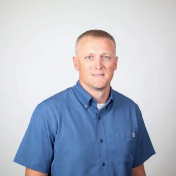 Chris Jackson in blue shirt